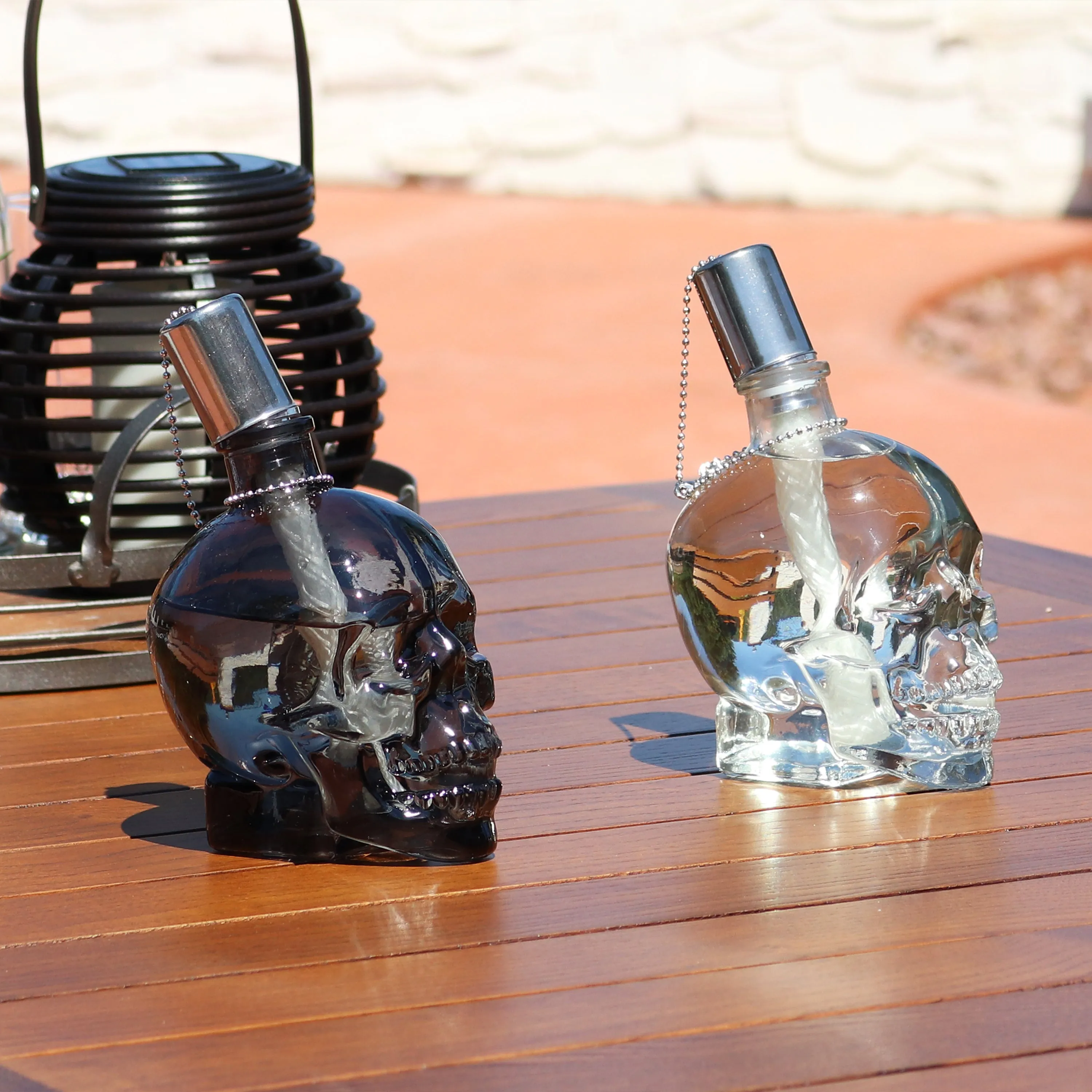 Sunnydaze Grinning Skull Glass Tabletop Torches - Black and Clear